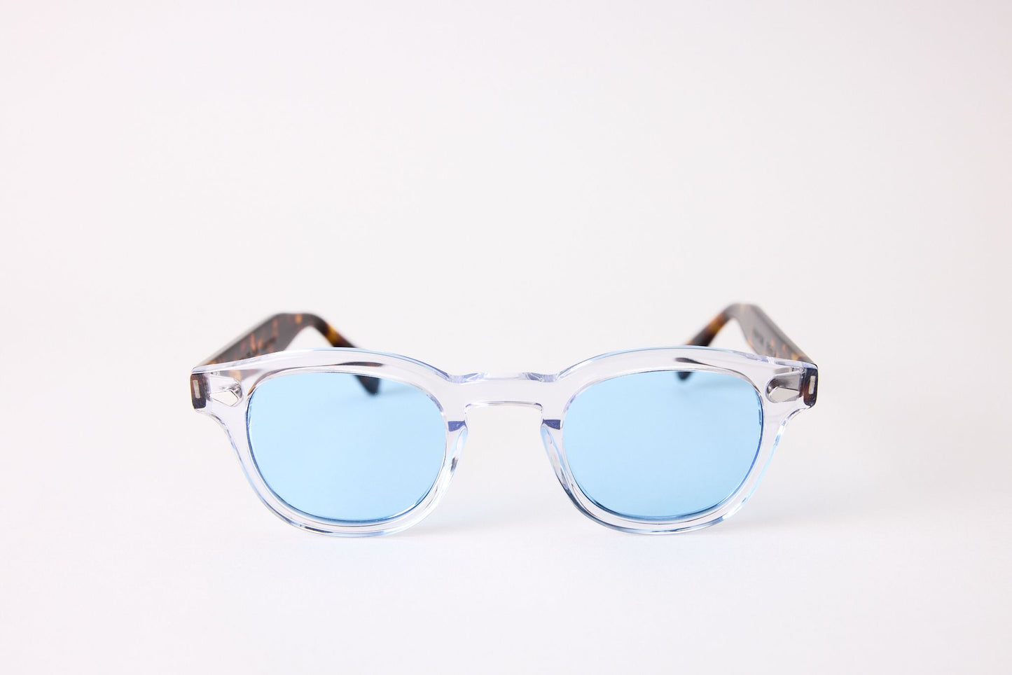 Small - NEW YORK EYERISH, Causeway. Clear Frames with Dark Tortoise Temples with Light Blue Lenses