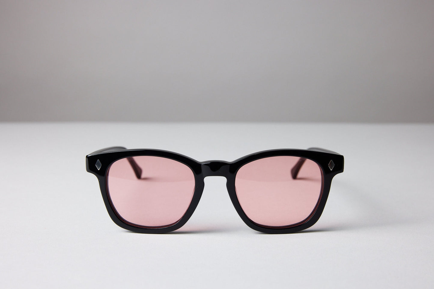 NEW YORK EYERISH, Castlerock. Black Frame with Rose Colored Lenses