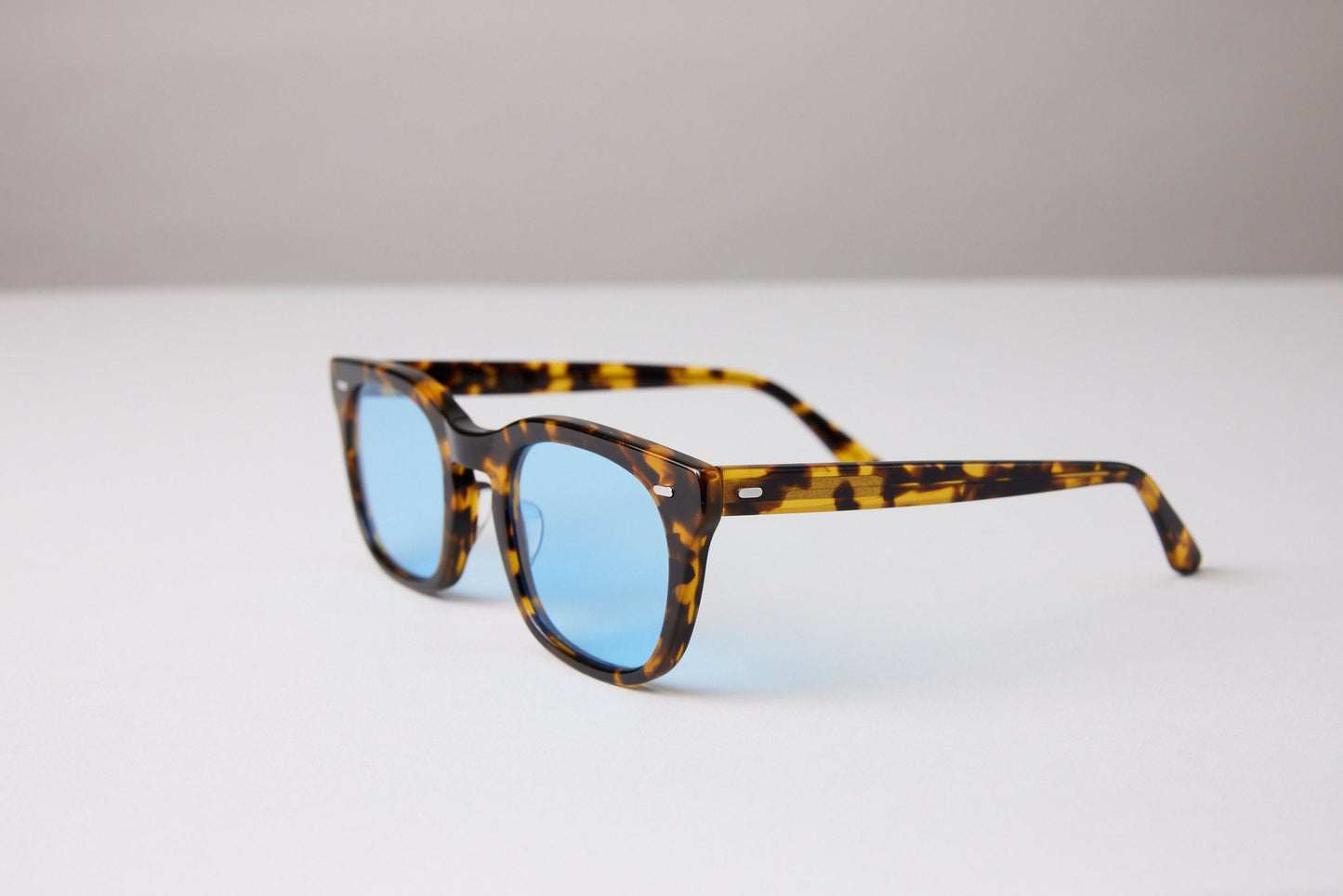 NEW YORK EYERISH, Dingle. Light Tortoise Shell Frame with Baby Blue Lenses