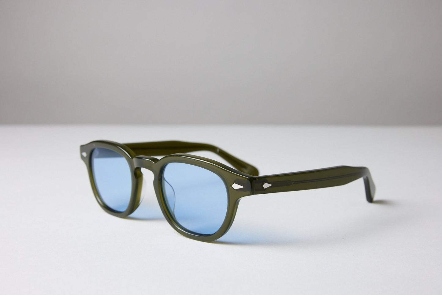 Large - New York Eye_rish, Causeway. Olive Green Frame with Baby Blue Lenses